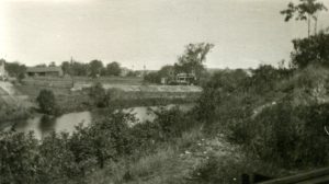 Looking northeast, 37 Summer St. is featured the distance at right, circa 1900. This scene nicely depicts the water and steeply banked landscape of Fowle’s Mill Pond.